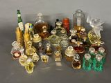 a lot of bottles of alcohol on the table