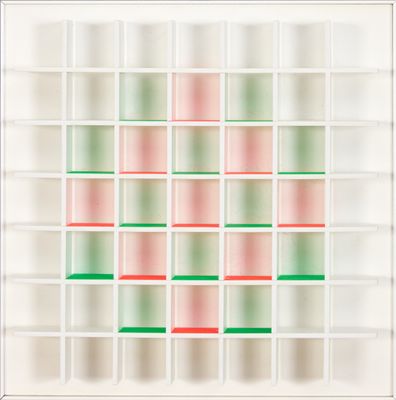 an image of a white bookcase filled with lots of colorful books