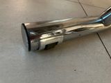 an image of a stainless steel shower head on a tiled floor