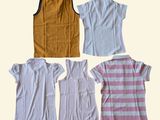 several different types of shirts are arranged in a row on a white background