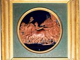 gold frame with a picture of a man on a horse and a woman on a horse