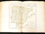 an open book with a map of spain and portugal on it