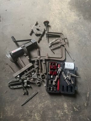 a lot of tools that are laying out on the floor