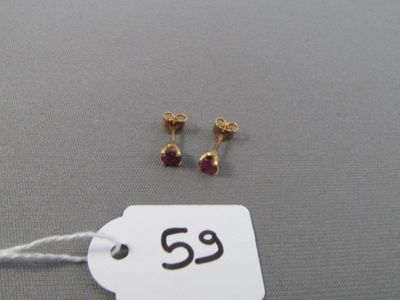 une étiquette sur laquelle est représentée une paire de boucles d'oreilles