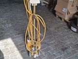 a machine that is sitting on the ground in a garage