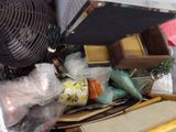 a pile of assorted items sitting on a table