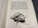 un livre ouvert sur lequel est dessiné un homme à cheval