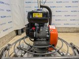 a machine that is sitting on the ground in a room