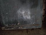 a picture of a dirty window in a dirty room