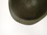 a close up of a helmet on a white surface