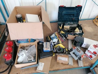 a box full of assorted items sitting on a table