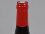 a bottle of wine that is sitting on a table
