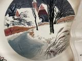 a plate with a picture of a church on it