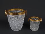 pair of cut glass ice buckets with gold rims and handles