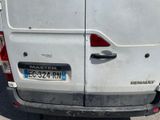 a white van that is parked in a parking lot