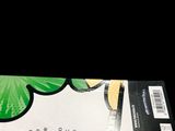 a ticket with a picture of a butterfly on it