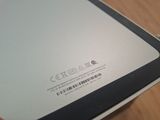 a close up of a laptop on a wooden table