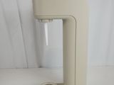 a white machine that is sitting on a table