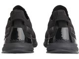 black sneakers with a logo on the sole and a rubber sole