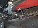 a close up of a motorcycle that is parked on the street