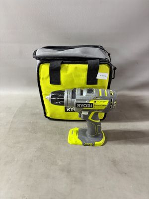 a cordless drill with a yellow bag and a cordless tool