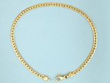a gold chain bracelet with a clasp on a blue background