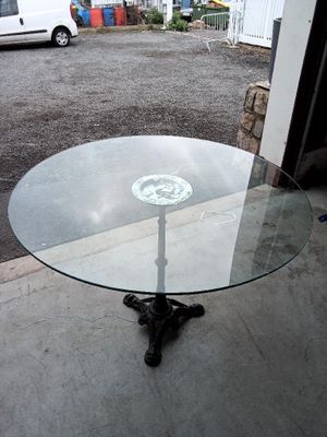 a glass table with a skull and crossbone design on it