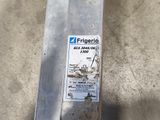 an image of a piece of metal with a sticker on it