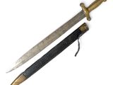 pair of old and worn swords on a white surface with a black handle