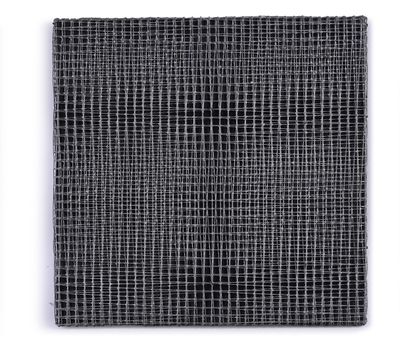 a close up of a piece of black cloth on a white surface