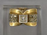 an image of a gold ring with a diamond in the center