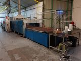 an image of a factory with a large machine in it