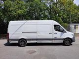 a white van that is parked in the parking lot