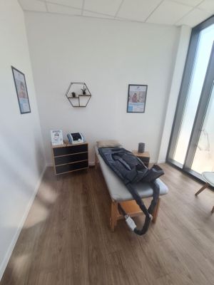 an image of a room with a couch and a window