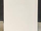 an image of a white refrigerator with a blue sticker on the door