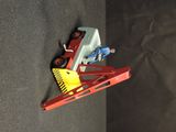a toy truck with a crane attached to the back of it