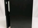 an image of a black box with its door open