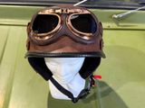 a helmet with goggles attached to it on a mannequin head