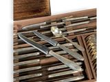 a wooden box with silverware in it and a spoon and spoon in it