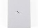 a close up of a white box with the word dior on it