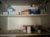 a cabinet with a lot of items on it