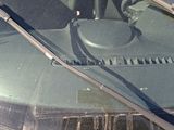 a windshield wiper on the windshield of a car
