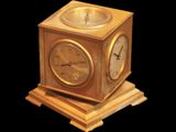 a gold clock sitting on top of a wooden stand