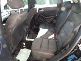 a picture of the inside of a car with the seats down
