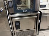 a microwave sitting on top of a counter in a kitchen
