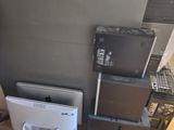 a lot of electronics that are sitting on the floor