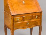 an old wooden desk with a drawer on top of it