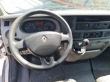 dashboard of a car with a steering wheel and dashboard gauges