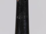 an image of a close up of a black vase on a table