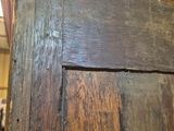 a close up view of a wooden door in a building